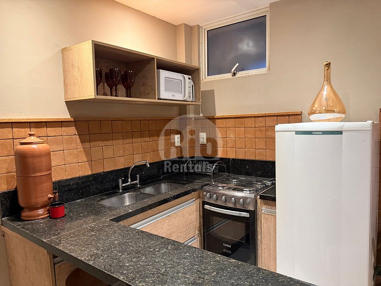 Acogedora sala y habitación en Copacabana